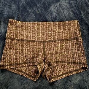 Girls size 10/12 (I think) Lululemon purple and black Boogie short